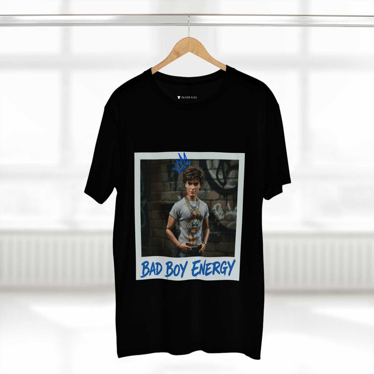Bad Boy Energy Tee by Oliver & Eli – white cotton t-shirt with graffiti print and bold artistic design.