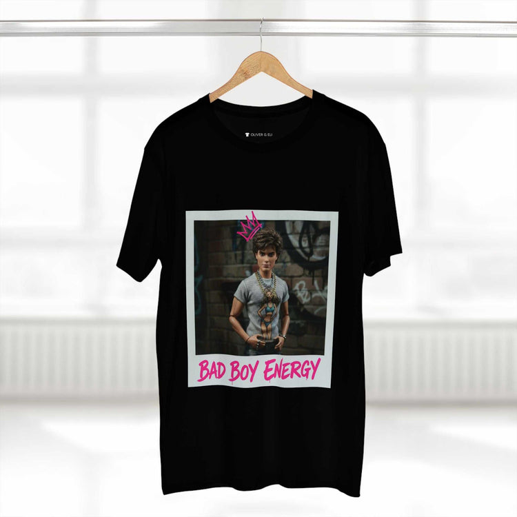 Bad Boy Energy Tee by Oliver & Eli – white cotton t-shirt with graffiti print and bold artistic design.