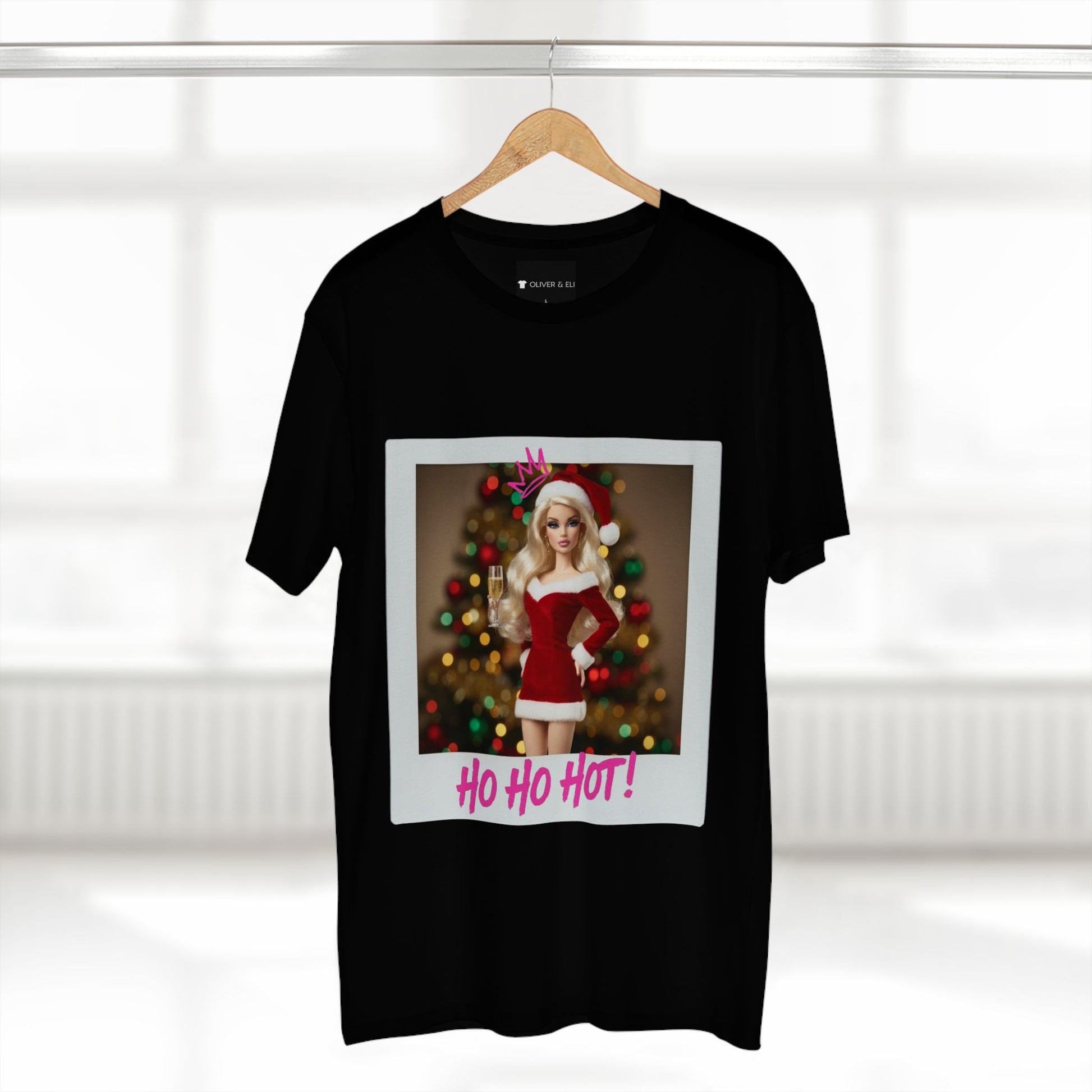 Oliver & Eli’s Sleigh Season collection — premium cotton Christmas t-shirt with graffiti print and festive design.