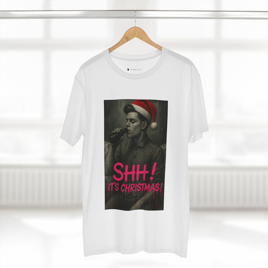 Model wearing tee from Oliver & Eli’s Sleigh Season collection — premium cotton Christmas t-shirt with graffiti print and festive design.