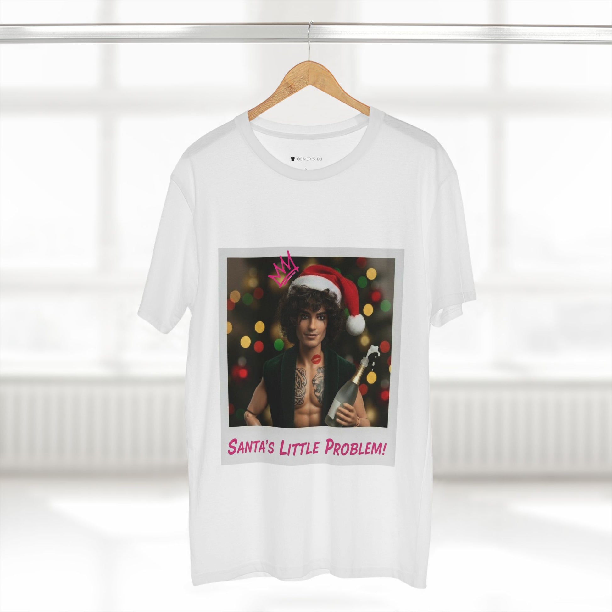 Oliver & Eli’s Sleigh Season collection — premium cotton Christmas t-shirt with graffiti print and festive design.