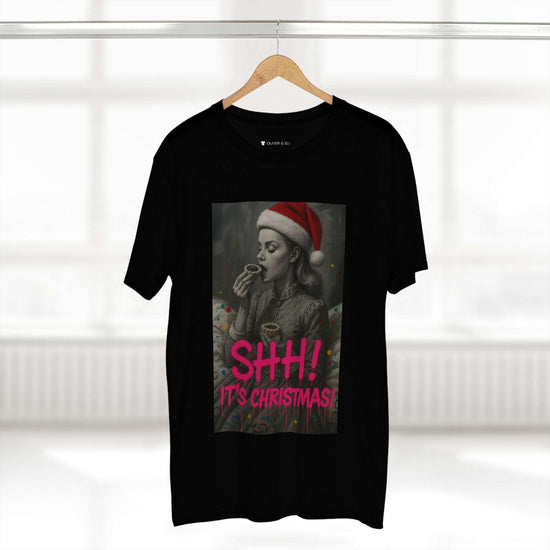 SHH! It’s Christmas T-shirt with grayscale vintage figure in Santa hat and pink graffiti text