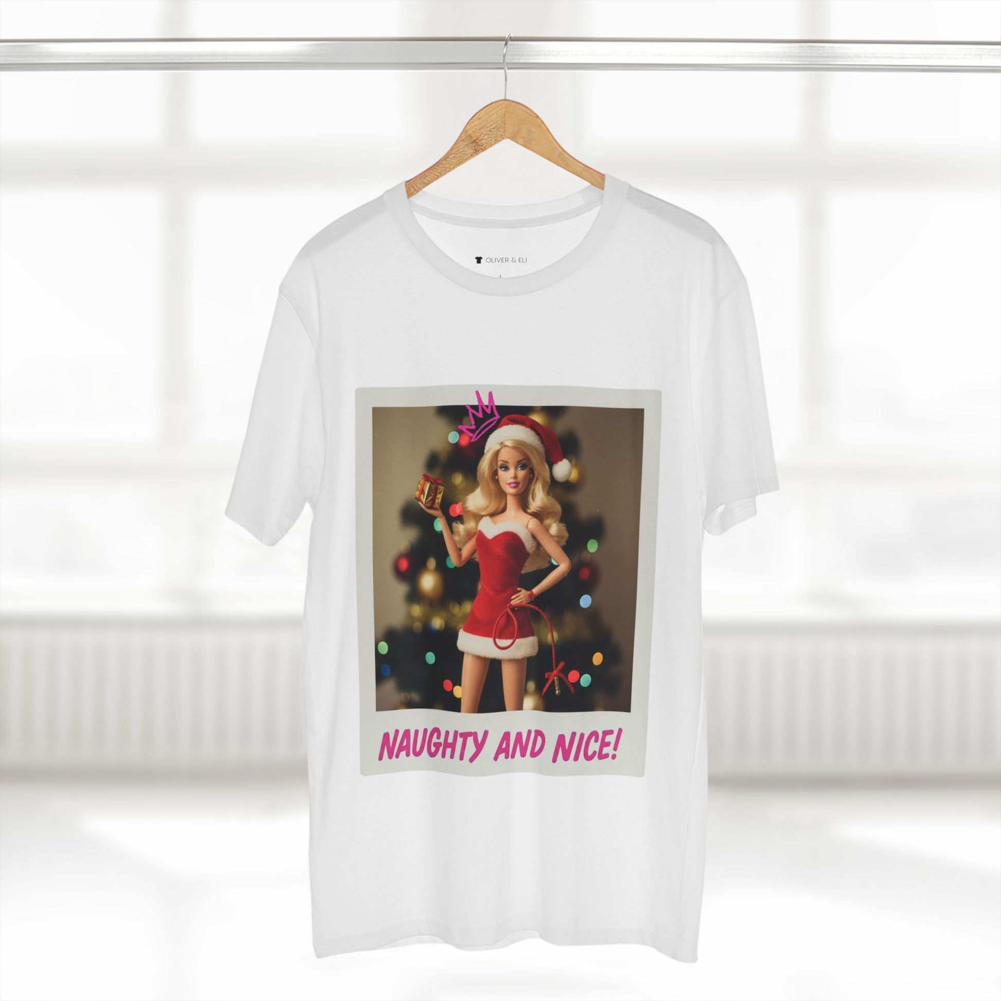 Oliver & Eli’s Sleigh Season collection — premium cotton Christmas t-shirt with graffiti print and festive design.